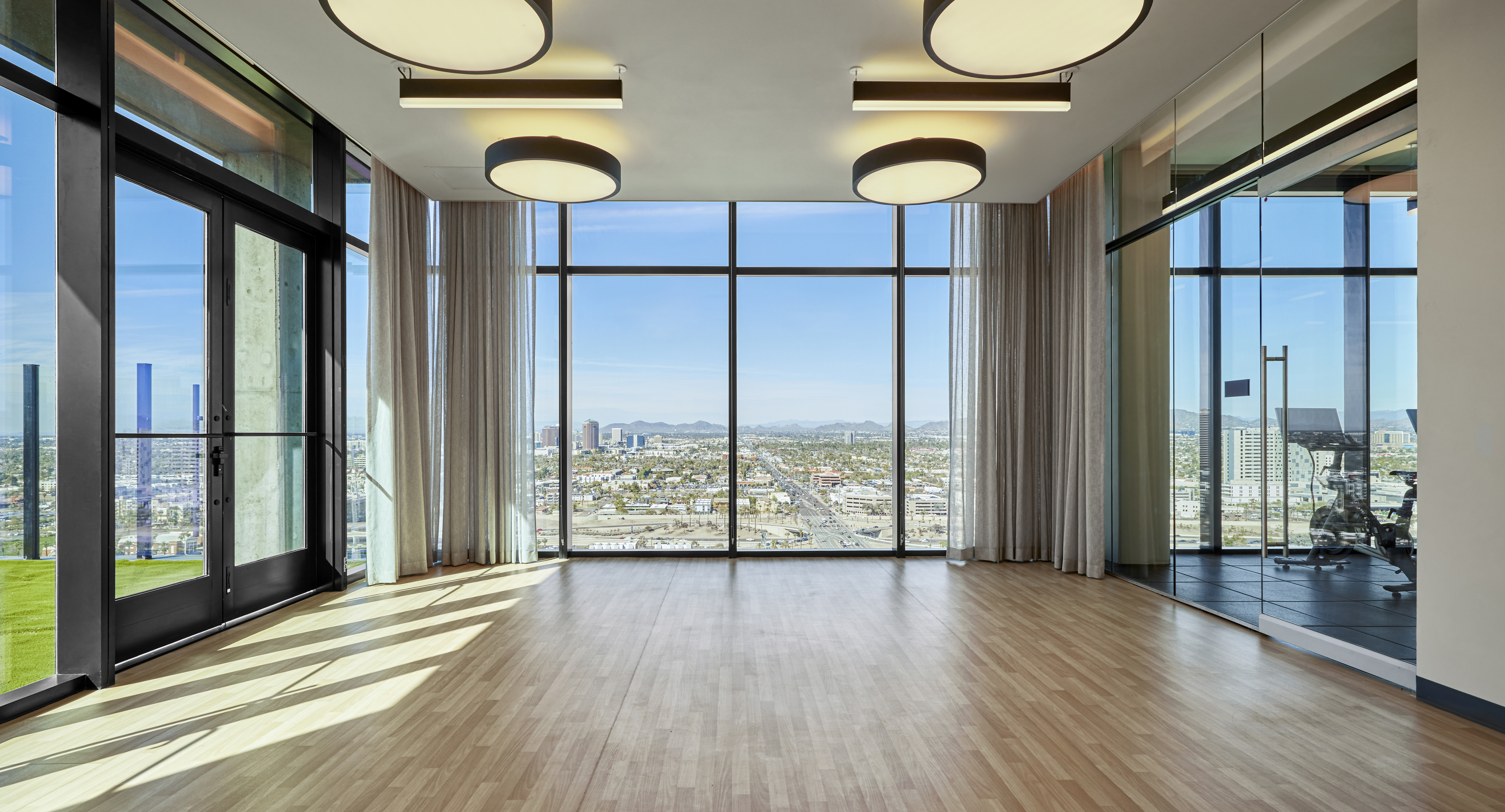 Yoga studio with floor-to-ceiling windows
